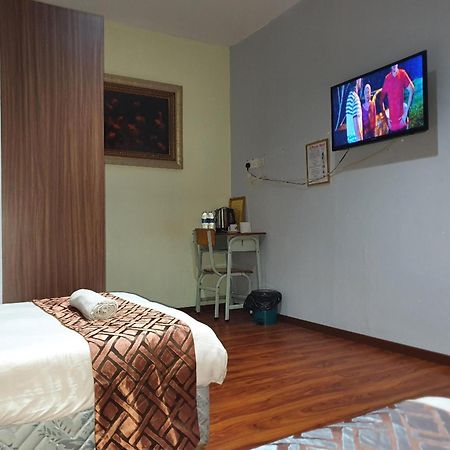 Oyo 90964 Melody 88 Inn Miri Eksteriør bilde